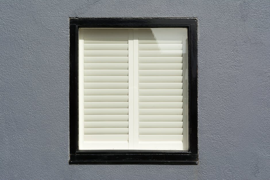 Elegant white plantation window shutters in a classic home